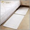 White absorbent bath mat