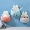 Seamless toothbrush holder