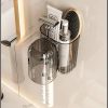 Wall mounted Toothbrush holder with toothpaste dispenser and organising  space