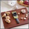 Multipurpose garlic /ginger grater