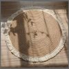 Round woven table mats with tassel