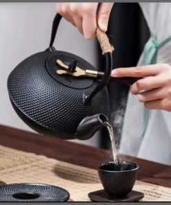 Original heavy duty cast iron tea pot with infuser, cast iron coaster and spoon