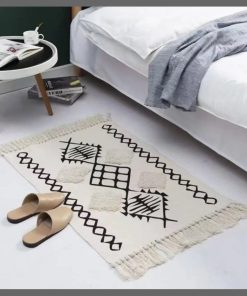 Bohemian Nordic style bedroom rug with tassels