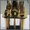 Heavy 24pc cutlery set with a rotating golden stand and packing box