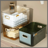 Big elegant gold handle container