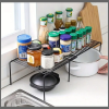 Expandable shelf raiser