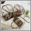 Fashionable multicolored diamond sling bag